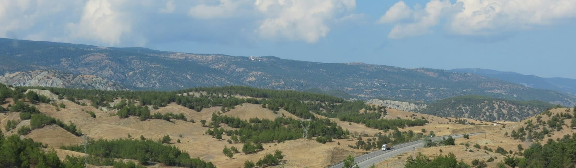 A road through open country, the kind of route where speed is hardest to police.