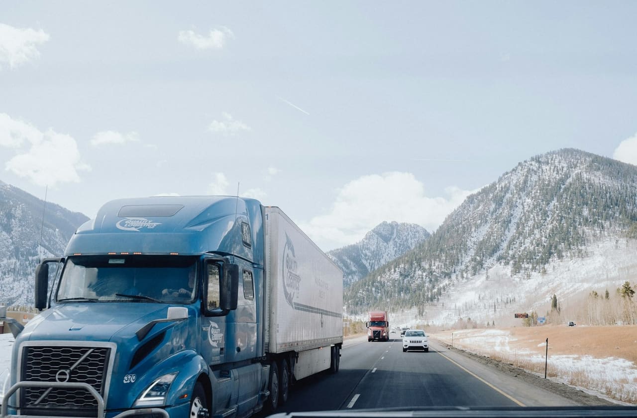A truck on a highway, one of the vehicles a KASSA fleet keeps track of.