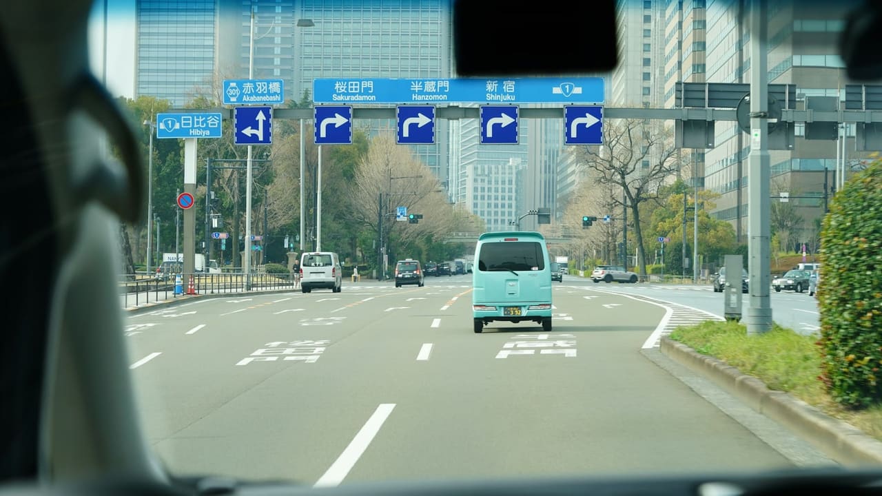 The road ahead through a vehicle's windscreen — the view a road-facing camera records.